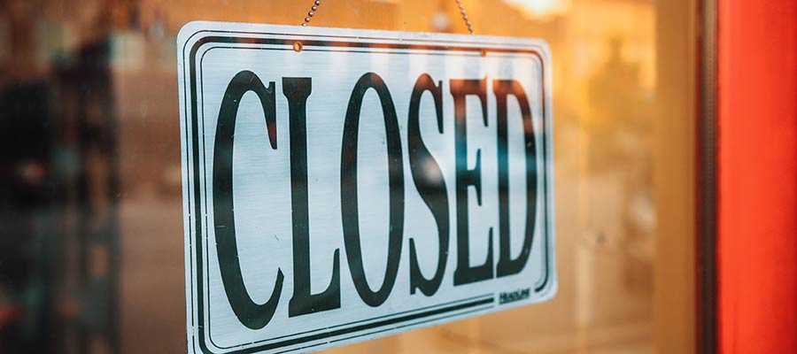 A sign that reads: "Closed".