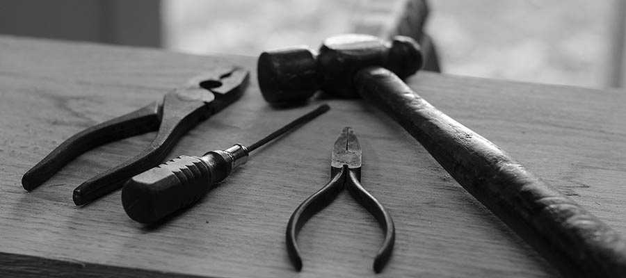 Tools sit on a table.